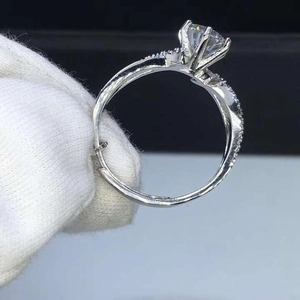 Exquisite silver color wedding ring set with brilliant round zircon and pave side stones