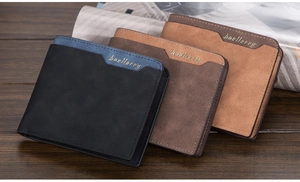Three men's short wallets in black, dark brown, and light brown on a wooden surface
