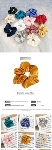 Detail of 12cm oversized satin scrunchies with silky texture and elegant pearl luster