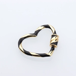 Detailed view of heart-shaped screw lock clasp with gold and black enamel striped finish
