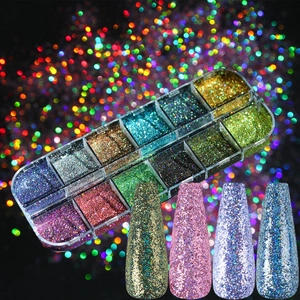 Detailed view of 12-grid nail glitter box with colorful sequins and finished nail art samples