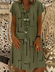 Army green V-neck short sleeve dress with black geometric lines in bohemian style