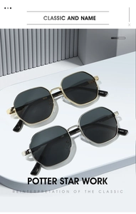 Detailed macro shot of vintage hexagonal metal sunglasses frames in gold and silver finish