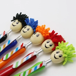 Detailed close-up of cartoon doll pens with microfiber mop hair and touchscreen tip
