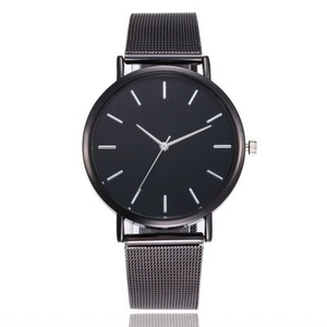 Minimalist ultra-thin quartz watch with black dial and Milanese mesh steel strap