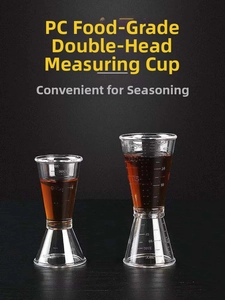 Close-up of dual-head PC resin jiggers with precise food-grade measurement scales