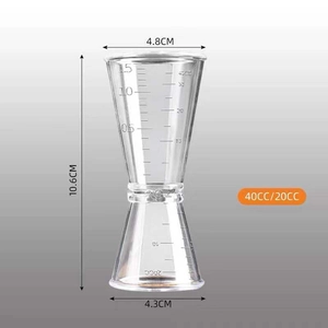 Detail view of clear PC resin double jigger with metric markings 40CC and 20CC