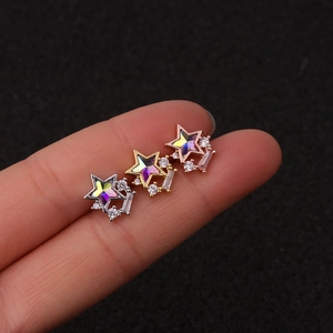 Detailed set of silver, gold and rose gold star cartilage studs with colored zircons