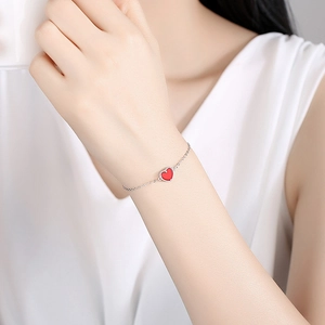 Minimalist S925 sterling silver chain bracelet with a dainty red heart charm for women
