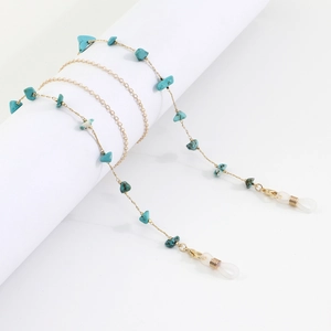 Golden chain eyewear strap featuring natural turquoise stones and adjustable silicone loops