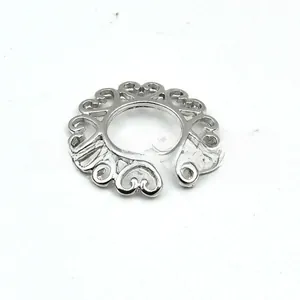 Macro shot of silver non-piercing heart-shaped ring jewelry with hollow design
