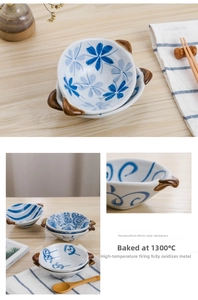 Macro detail of hand-painted ceramic sauce bowl with dual handles and floral patterns