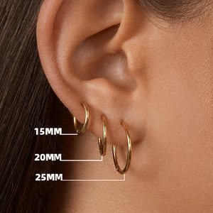 Close-up of 18K gold-plated stainless steel hoop earrings in 15mm 20mm 25mm sizes