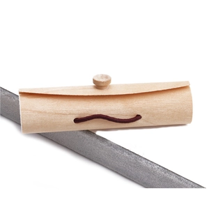 Detailed macro view of a cylindrical wooden jewelry gift box with an elastic rope fastener