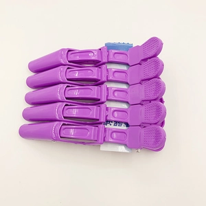 Set of 5 professional purple crocodile hair clips for salon styling and sectioning