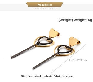 Détail de boucles d'oreilles cœur en acier inoxydable avec long pendentif barres noires