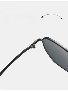 Close-up of durable metal hinge on black polygon sunglasses with secure screw mechanism
