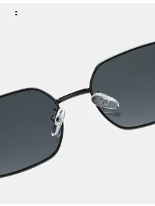 Close-up of soft silicone nose pads on black metal polygon sunglasses for comfort