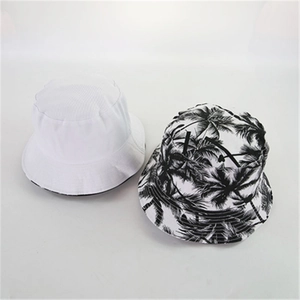 Top view of white and palm tree print reversible cotton bucket hat showing wide brim structure