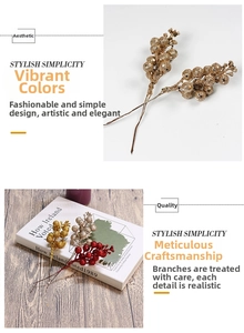 Close-up of glitter-coated red and gold Christmas berry stems for festive DIY wreaths
