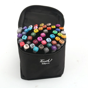 Detailed top view of 48-color double-headed alcohol markers set in a black storage case