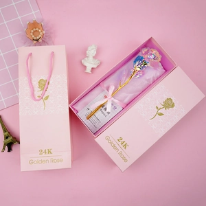 Detail of 24K gold foil rose with pink gift box, matching handbag and certificate