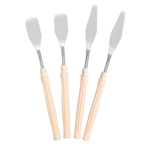 Detail of four stainless steel palette knives with various blade shapes and plastic handles