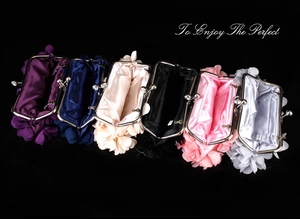 Detailed collection of 3D floral evening clutches in six colors with rhinestone metal clasps