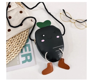 Close-up of a cute black carrot cartoon crossbody bag with green leaves and tiny shoes