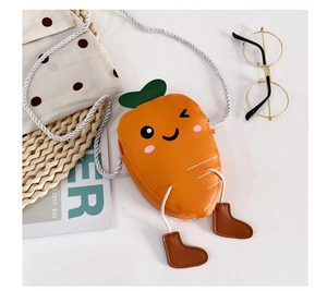 Detail shot of cute carrot-shaped mini shoulder bag with wink face and leg charms