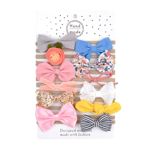 Lot de 10 bandeaux bébé en nylon avec nœuds colorés et dentelle dans un emballage cadeau