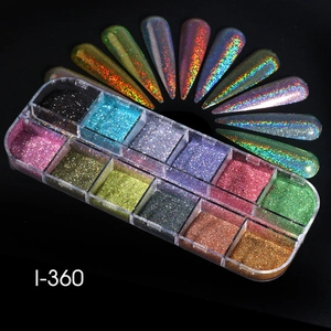 Detailed macro view of 12 colors holographic fine nail glitter flakes in storage box