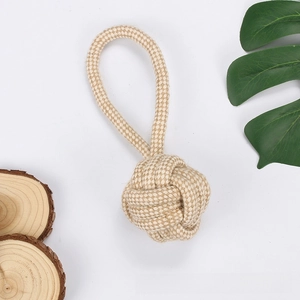 Detail of durable cotton rope dog toy with monkey fist knot and loop for pet teeth cleaning