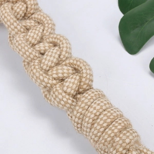 Close-up detail of the durable hand-woven cotton linen rope texture for dog chew toys