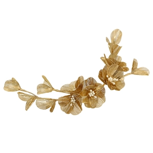 Elegant gold flower bridal headpiece with white beads and leaf vine design on white background