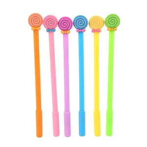 Set of six colorful lollipop gel pens with silicone toppers on white background