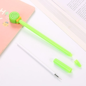 Green lollipop cartoon gel pen with silicone head shown in disassembled parts on a notebook