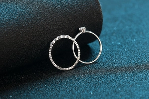 Close-up of S925 sterling silver wedding ring set with sparkling moissanite stones