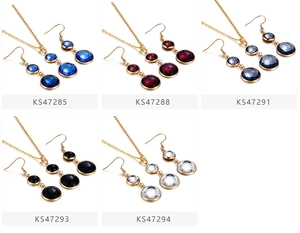 Collage of stainless steel necklace and earring sets in blue, red, grey, black, and white