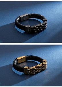 Macro detail of men's braided leather bracelet with black and gold magnetic metal clasps