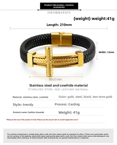 Detailed view of black braided leather bracelet with gold stainless steel cross and clasp
