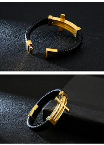 Detail of cross element on woven leather bracelet with golden magnetic clasp