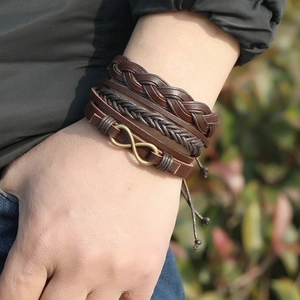 Retro multi-layer woven brown leather bracelet set with bronze infinity symbol charm