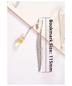 Silver metal feather bookmark featuring a resin ball pendant with real yellow dried flowers