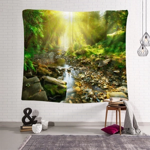 Detail of forest stream tapestry hung on a white brick wall in a cozy modern room