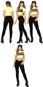 Jeans skinny neri con strappi alle ginocchia e bordi sfrangiati per donne