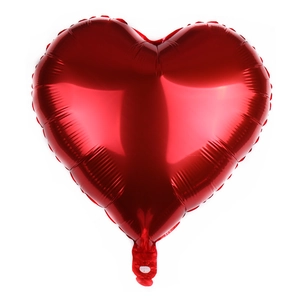 Polished heart-shaped red foil balloon for wedding and party decorations on white background