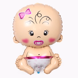 Macro view of baby girl foil balloon with pink bow and pacifier for 1st birthday decor