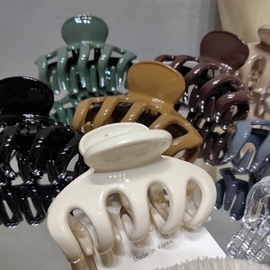 Medium minimalist shark hair claw clips in various solid colors for women