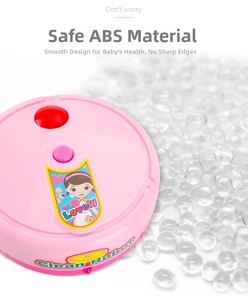 Macro shot of pink kids clean robot toy showing smooth ABS material and round design